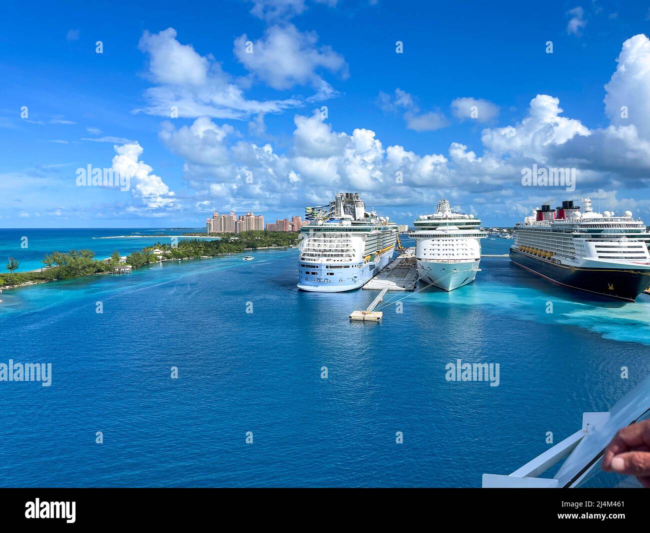 Nassau, Bahamas - October 13, 2021: An aerial view of the cruise ship harbor in Nassau, Bahamas from a cruise ship that is sailing away. Stock Photo