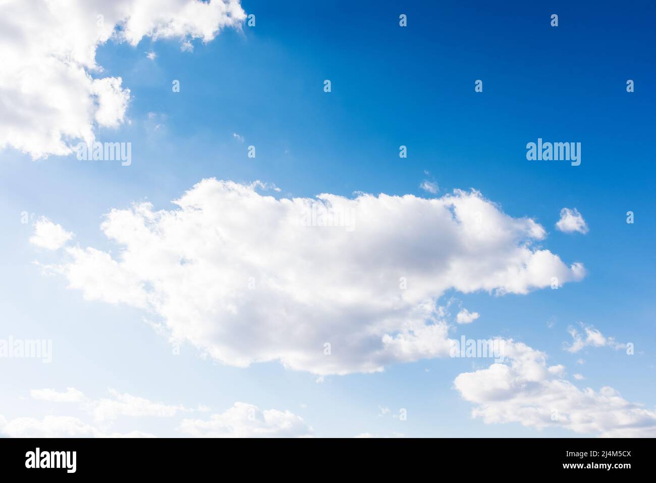 blue sky and white clouds on a sunny weather. world environment day concept. nature series in summer. creative gradient background for installation an Stock Photo