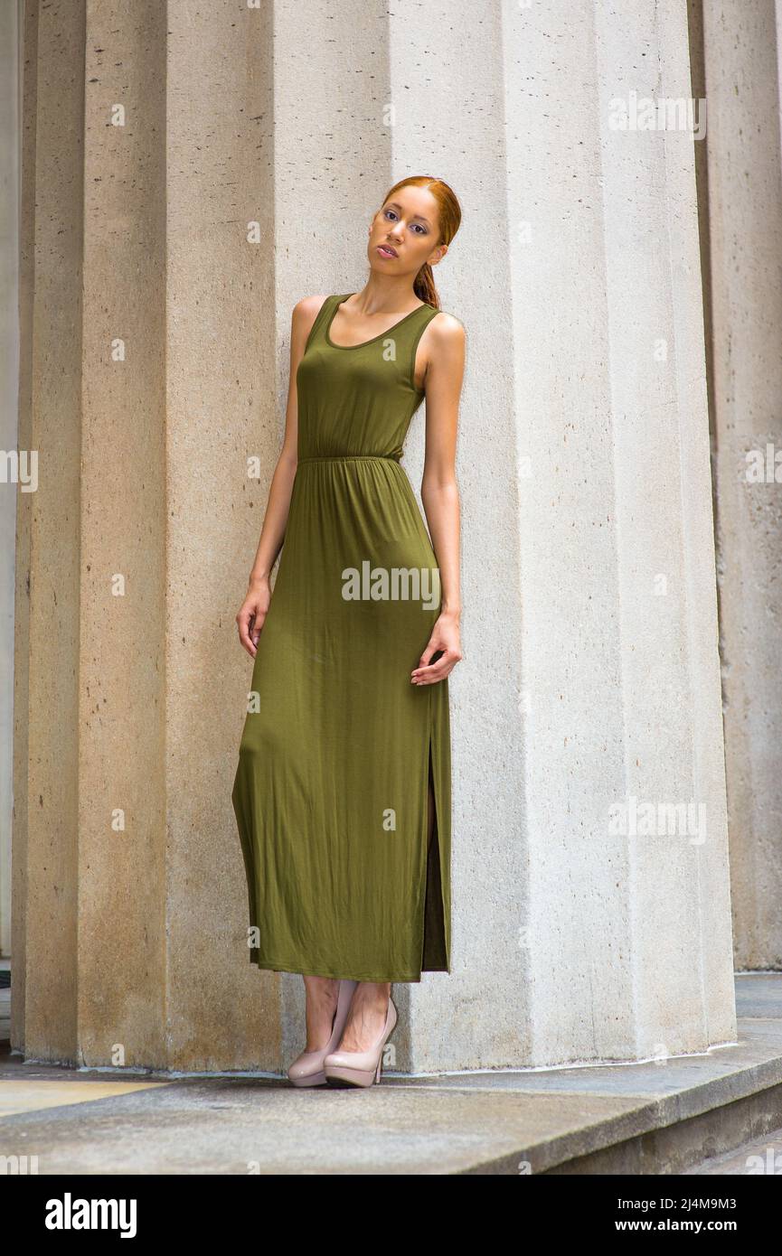 Dressing in a green Maxi Tank Dress, creamy high heels, a young fashion black girl is standing by a huge column, relaxing and thinking Stock Photo - Alamy Dressing in a green Maxi Tank Dress, creamy high heels, a young fashion black girl is standing by a huge column, relaxing and thinking Stock Photo - Alamy
