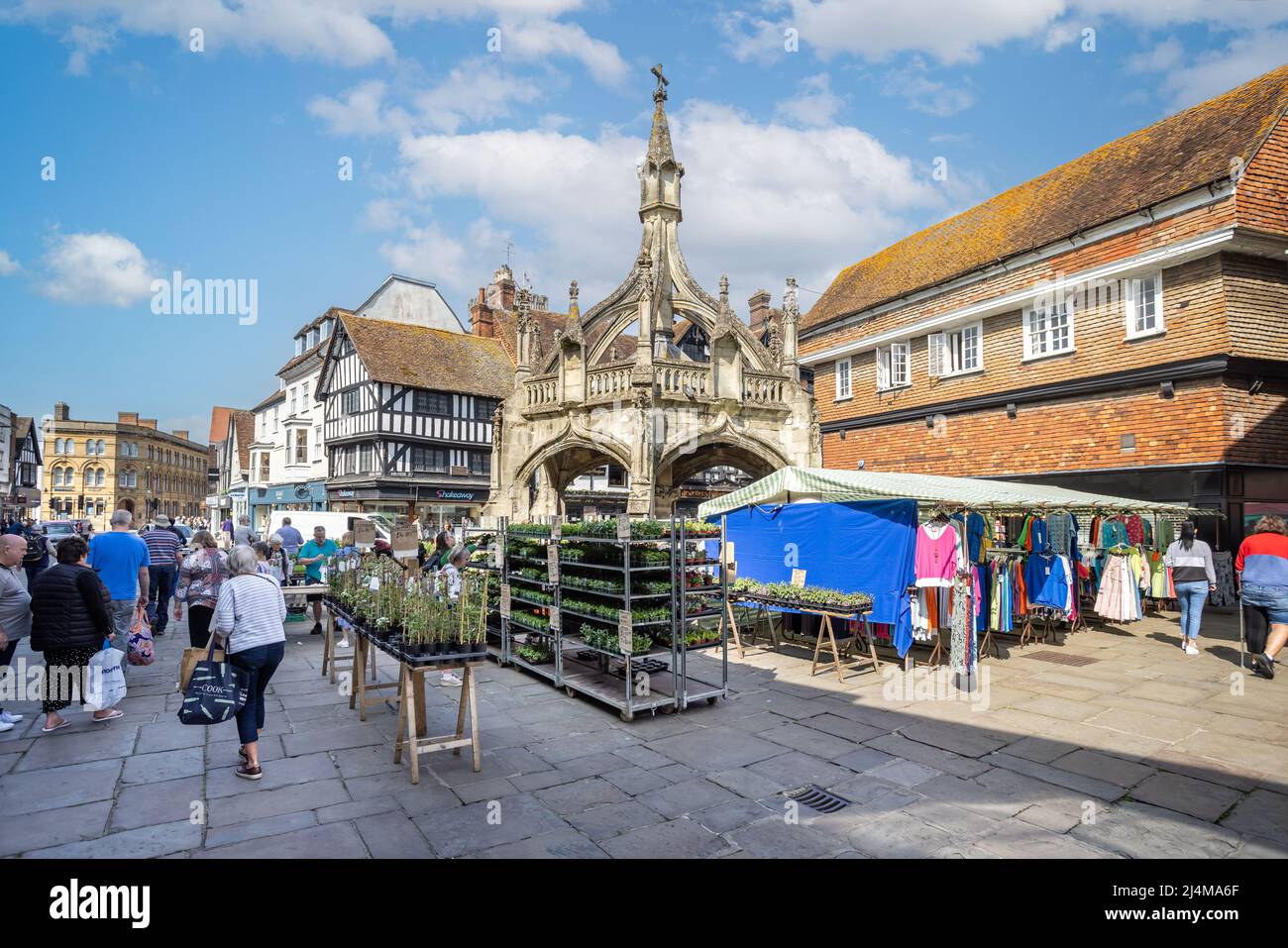 Salisbury Saturday Market stalls around historic Poultry Cross in Salisbury, Wiltshire, UK on 16 April 2022 Stock Photo