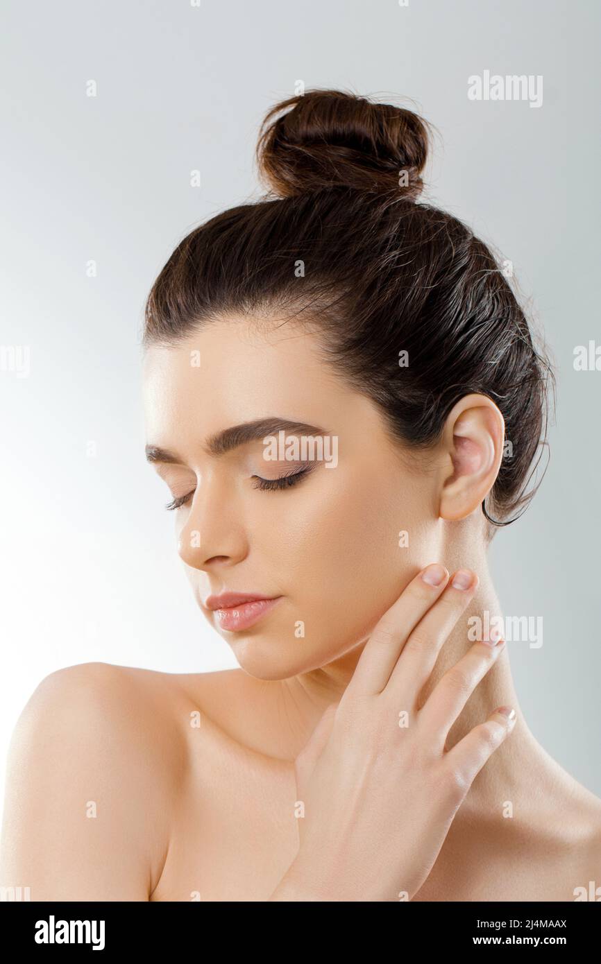 Beauty Face. Beautiful Woman With Natural Makeup touch own face. Girl ...