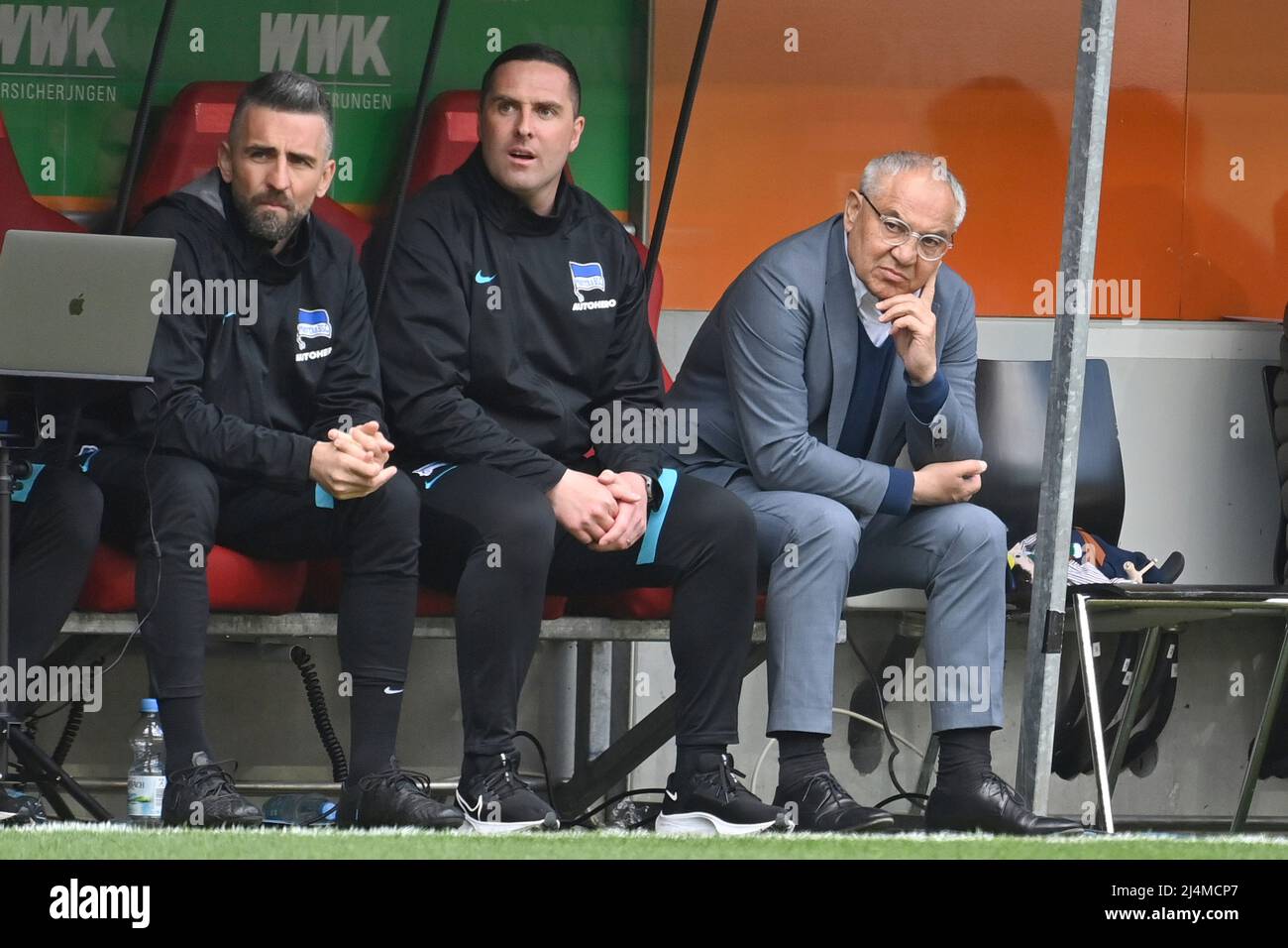 Augsburg, Deutschland. 16th Apr, 2022. v.re:Felix MAGATH (coach Hertha BSC), co-coach Mark Fotheringham (Hertha BSC), Vedad IBISEVIC (offensive coach Hertha) on the bench football 1st Bundesliga season 2021/2022, 30th matchday, matchday30, FC Augsburg -Hertha BSC Berlin 0-1, on April 16th, 2022 WWK ARENA in Augsburg, Credit: dpa/Alamy Live News Stock Photo