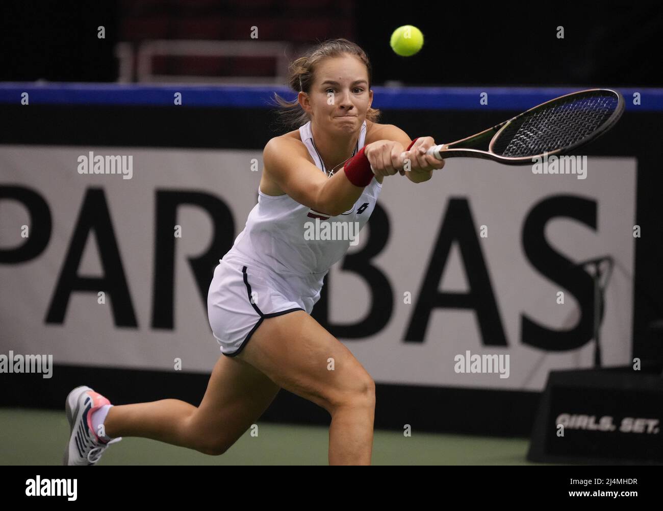 April 15, 2022, VANCOUVER, BC, CANADA: Latvia's Daniela Vismane returns to  Canada's Rebecca Marino during a Billie Jean King Cup qualifier singles  tennis match, in Vancouver, on Friday, April 15, 2022. (Credit
