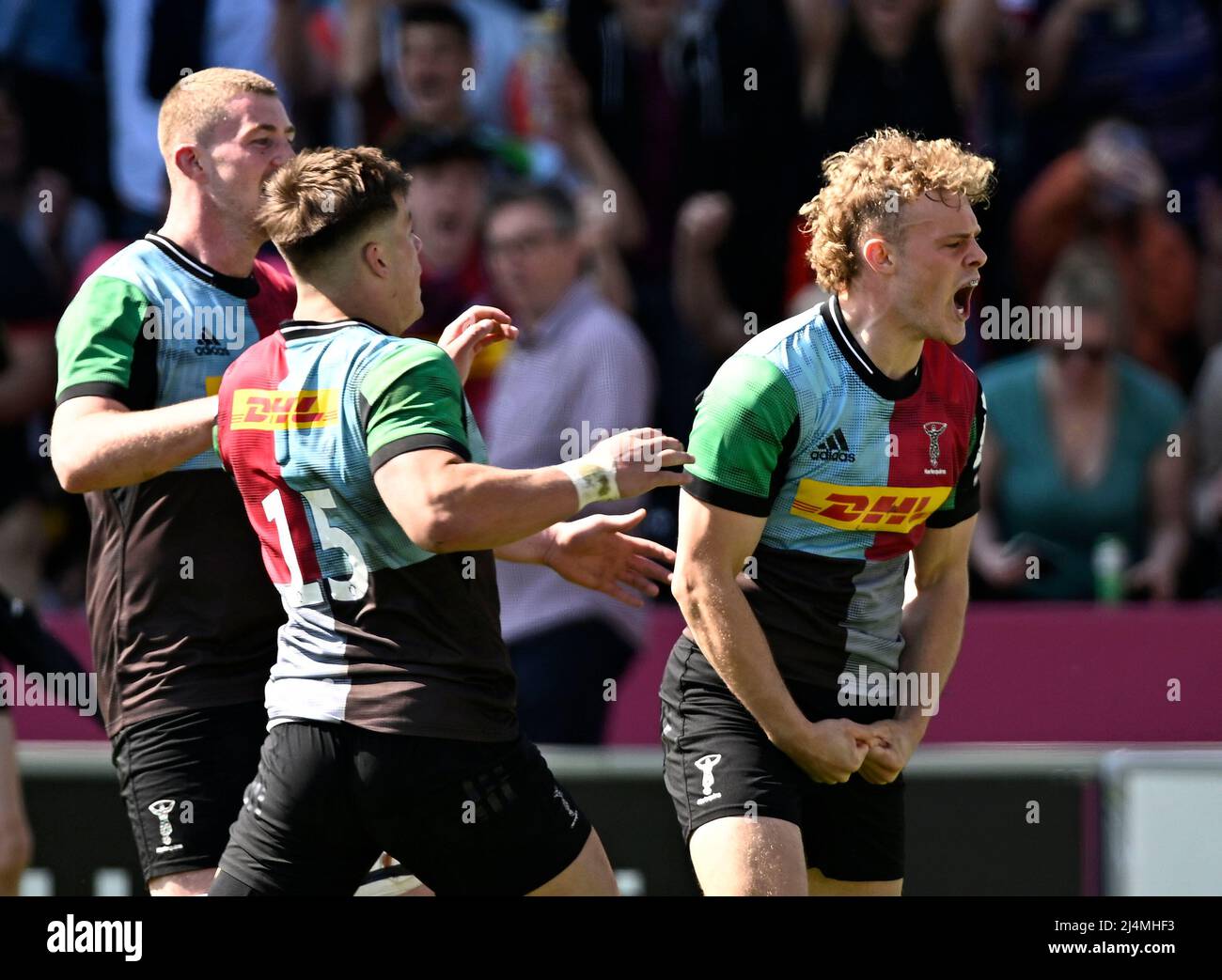 Twickenham, United Kingdom. 16th Apr, 2022. Heineken Champions Cup round of 16 Rugby. Harlequins V Montpelier. Twickenham Stoop. Twickenham. Louis Lynagh (Harlequins, right) celebrates scoring the 5th try for Harlequins as Huw Jones (Harlequins, 15) joins induring the Harlequins V Montpelier Heineken Champions Cup round of 16, 2nd leg, rugby match. Credit: Sport In Pictures/Alamy Live News Stock Photo