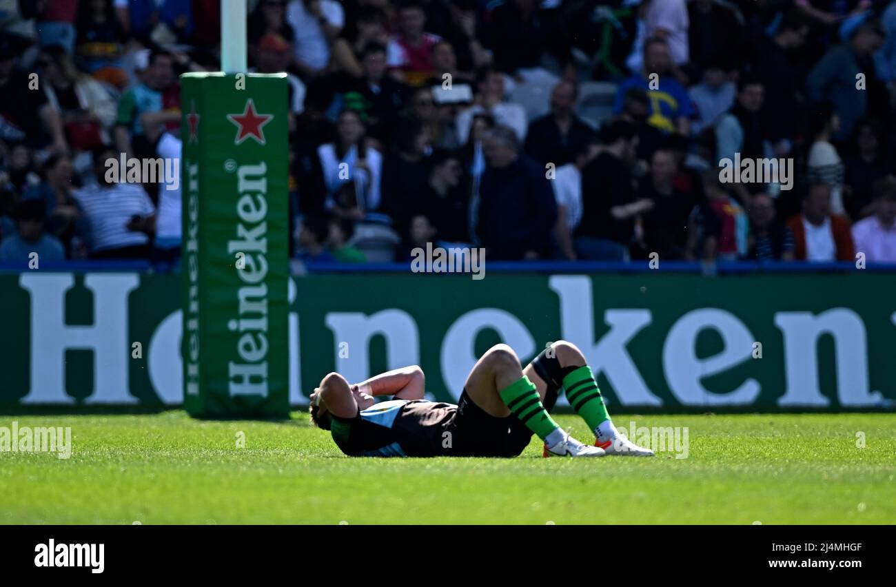Twickenham, United Kingdom. 16th Apr, 2022. Heineken Champions Cup round of 16 Rugby. Harlequins V Montpelier. Twickenham Stoop. Twickenham. Huw Jones (Harlequins) lies on the ground with disappointment at the end of the Harlequins V Montpelier Heineken Champions Cup round of 16, 2nd leg, rugby match. Credit: Sport In Pictures/Alamy Live News Stock Photo