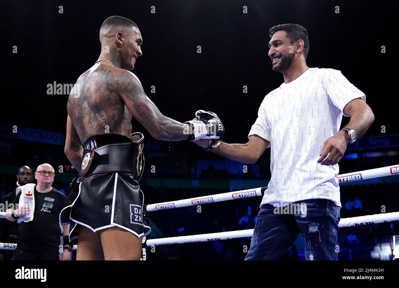Conor Benn (left) is congratulated by Amir Khan after knocking out Chris van Heerden in the World Boxing Association Continental Welter Title bout at the AO Arena, Manchester. Picture date: Saturday April 16, 2022. Stock Photo