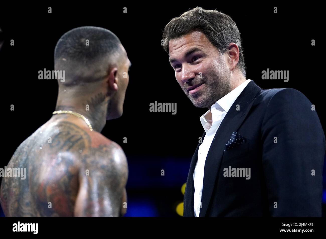 Conor Benn (left) is congratulated by Eddie Hearn after knocking out Chris van Heerden in the World Boxing Association Continental Welter Title bout at the AO Arena, Manchester. Picture date: Saturday April 16, 2022. Stock Photo