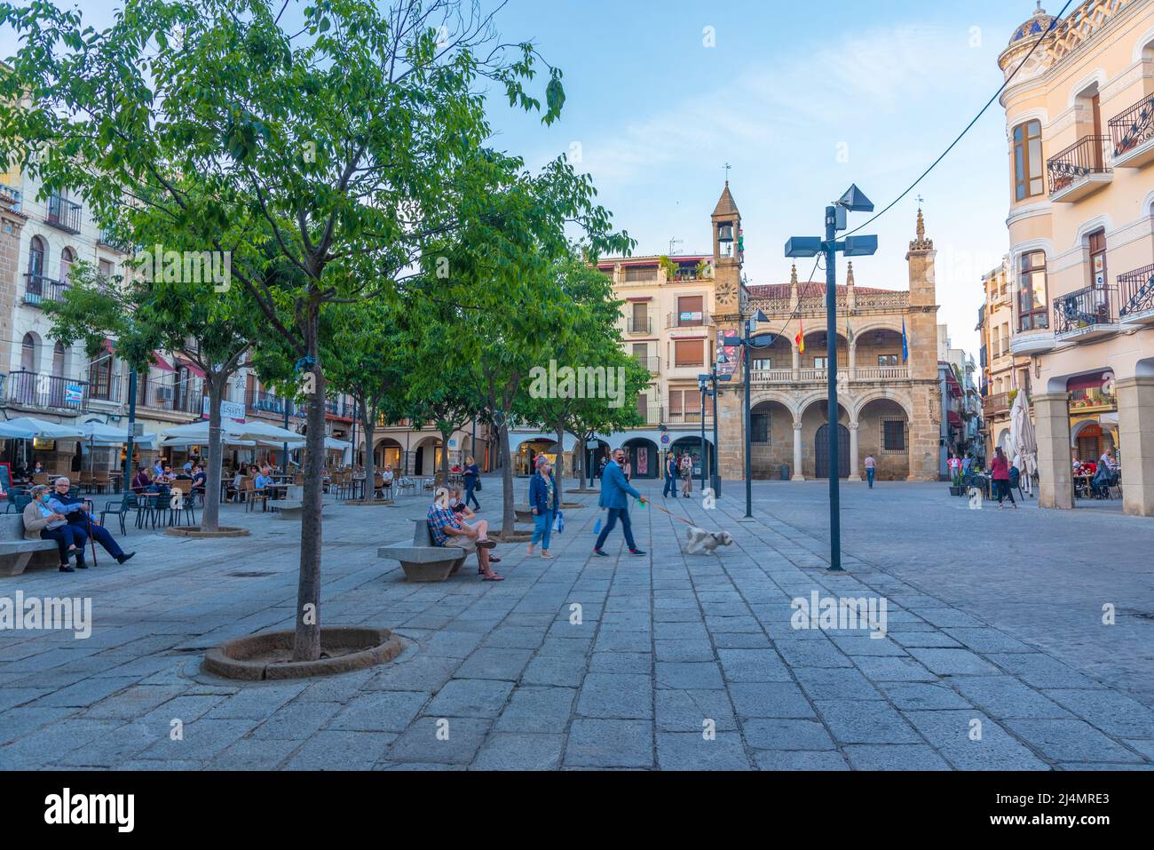 Plasencia, Spain, May 18, 2021: People are strolling on Plaza San Nicolas in Spanish town Plasencia Stock Photo