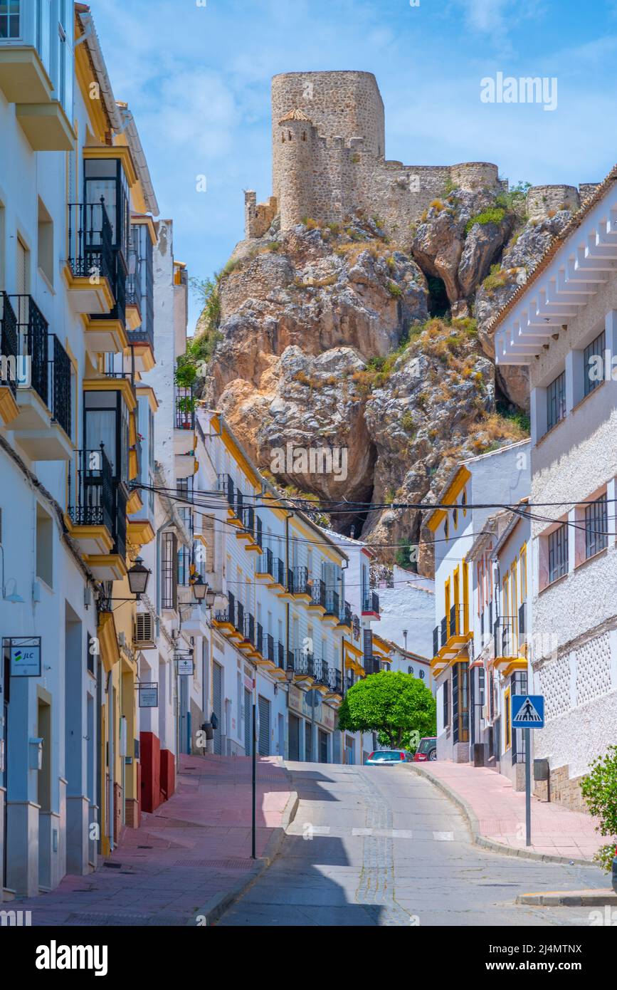 Olvera, Spain, May 22, 2021 White street in the old town of Spanish city Olvera leading to the