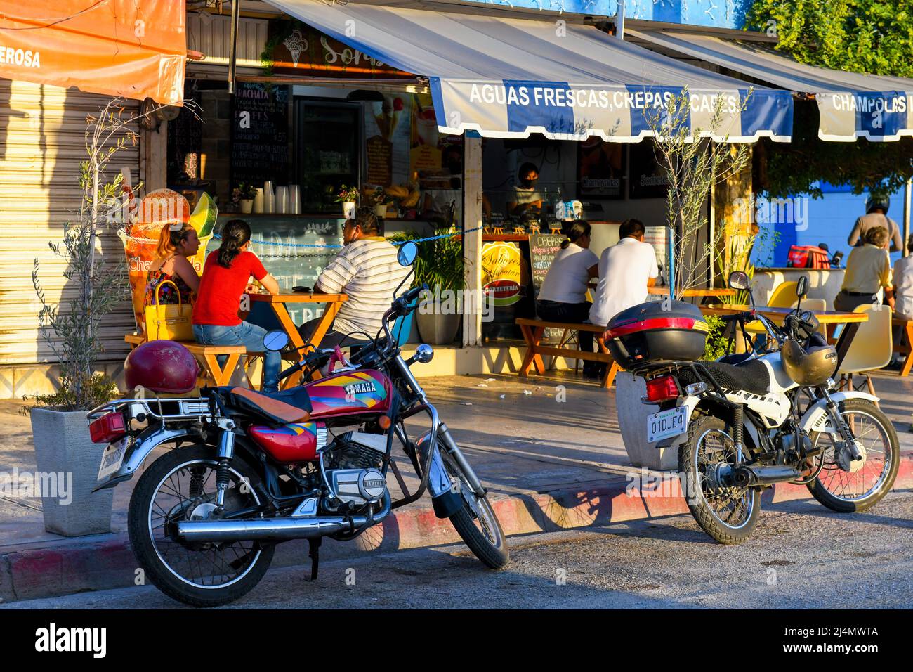 Sidewalk terrace of a cafe in La Ermita neighborhood, Merida Mexico Stock Photo