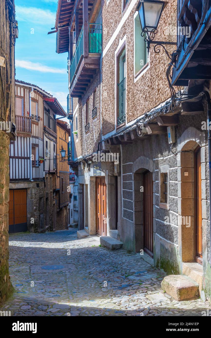 Timber houses alongside a narrow street in La Alberca village in Spain