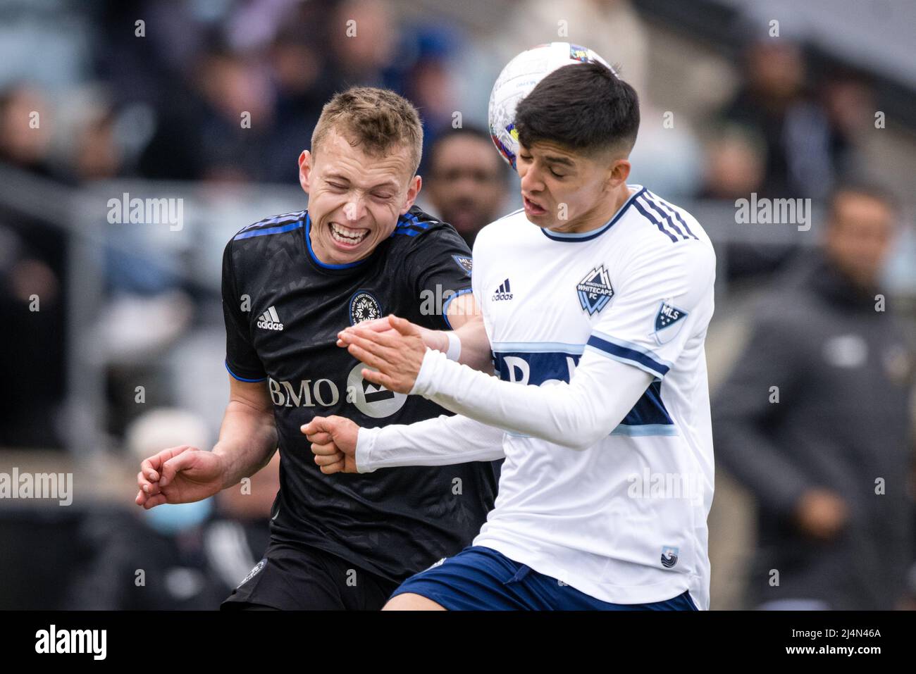 MONTREAL, QC - APRIL 16: Alistair Johnston (22) of CF MontrÃ©al battles with CristiÃ¡n GutiÃ©rrez (3) of Vancouver Whitecaps for possession of the ball during the second half of the MLS game between the Vancouver Whitecaps and the CF Montreal game on April 16, 2022, at Stade Saputo in Montreal, QC  (Credit Image: © Vincent Ethier/Icon SMI via ZUMA Press) Stock Photo