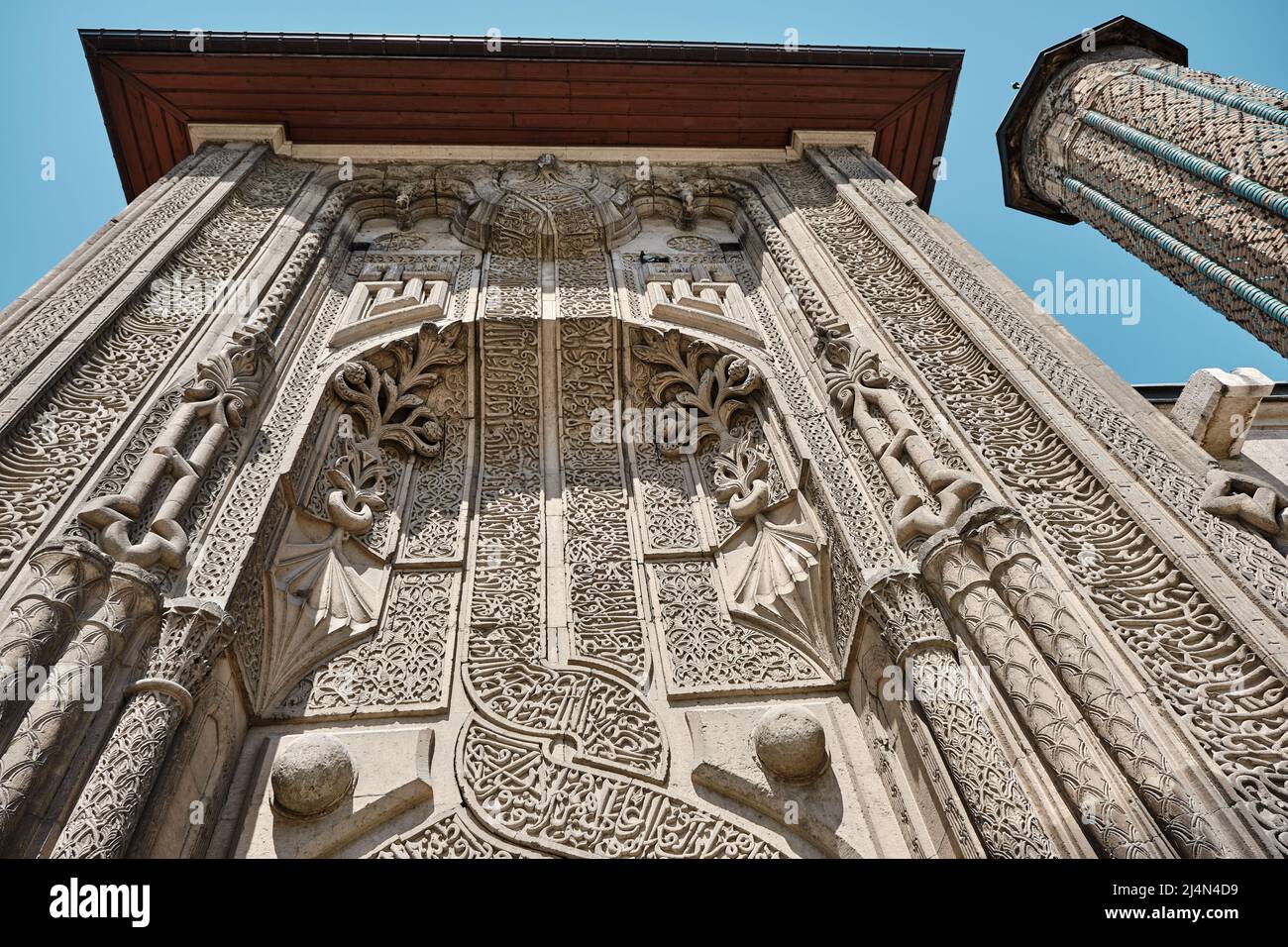 Low angle of ince minaret mosque in Konya, Entrance gate of mosque ...