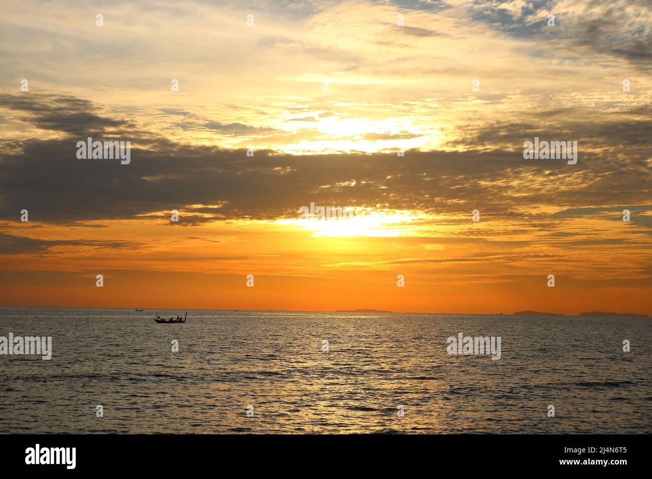 landscape view of peaceful ocean with beautiful sunset background Stock Photo