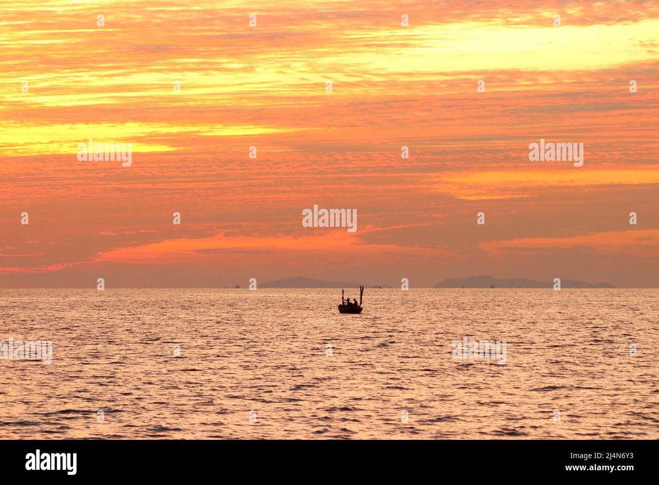 landscape view of peaceful ocean with beautiful sunset background Stock Photo