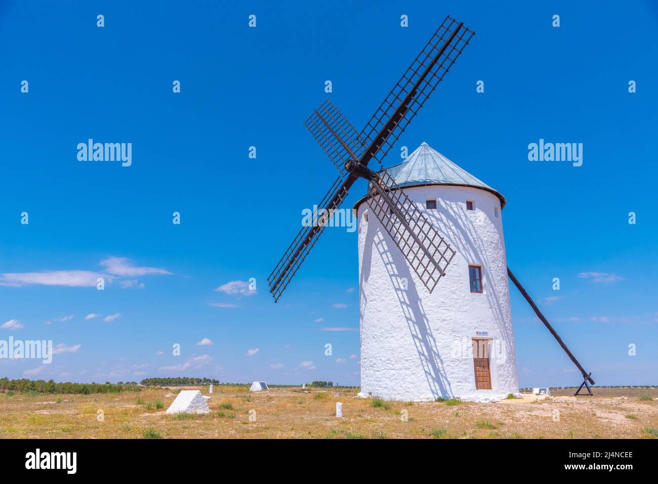 White windmills at Campo de Criptana in Spain Stock Photo