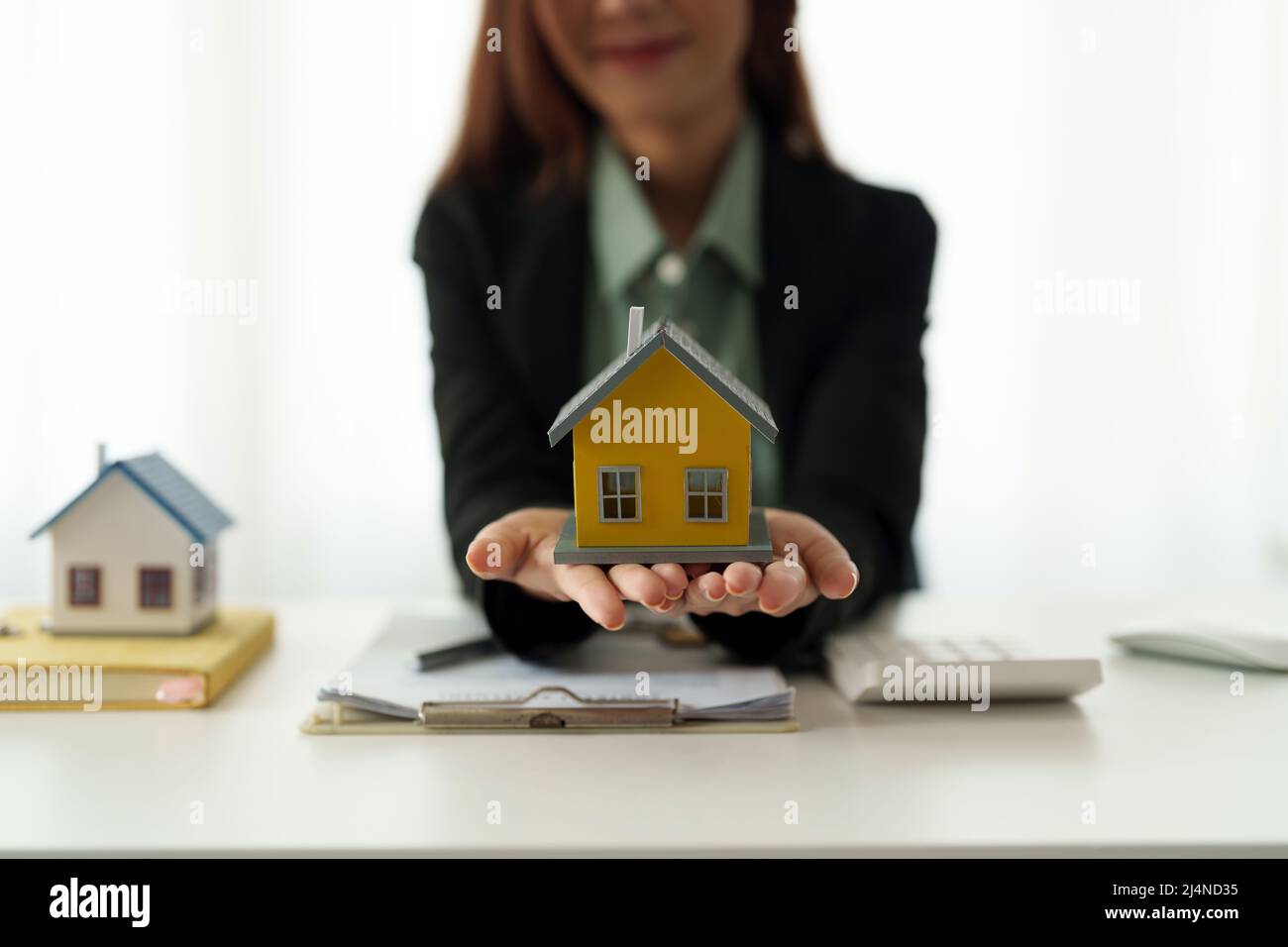 Real estate agent hand over property new home to a customer - business finance concept Stock Photo