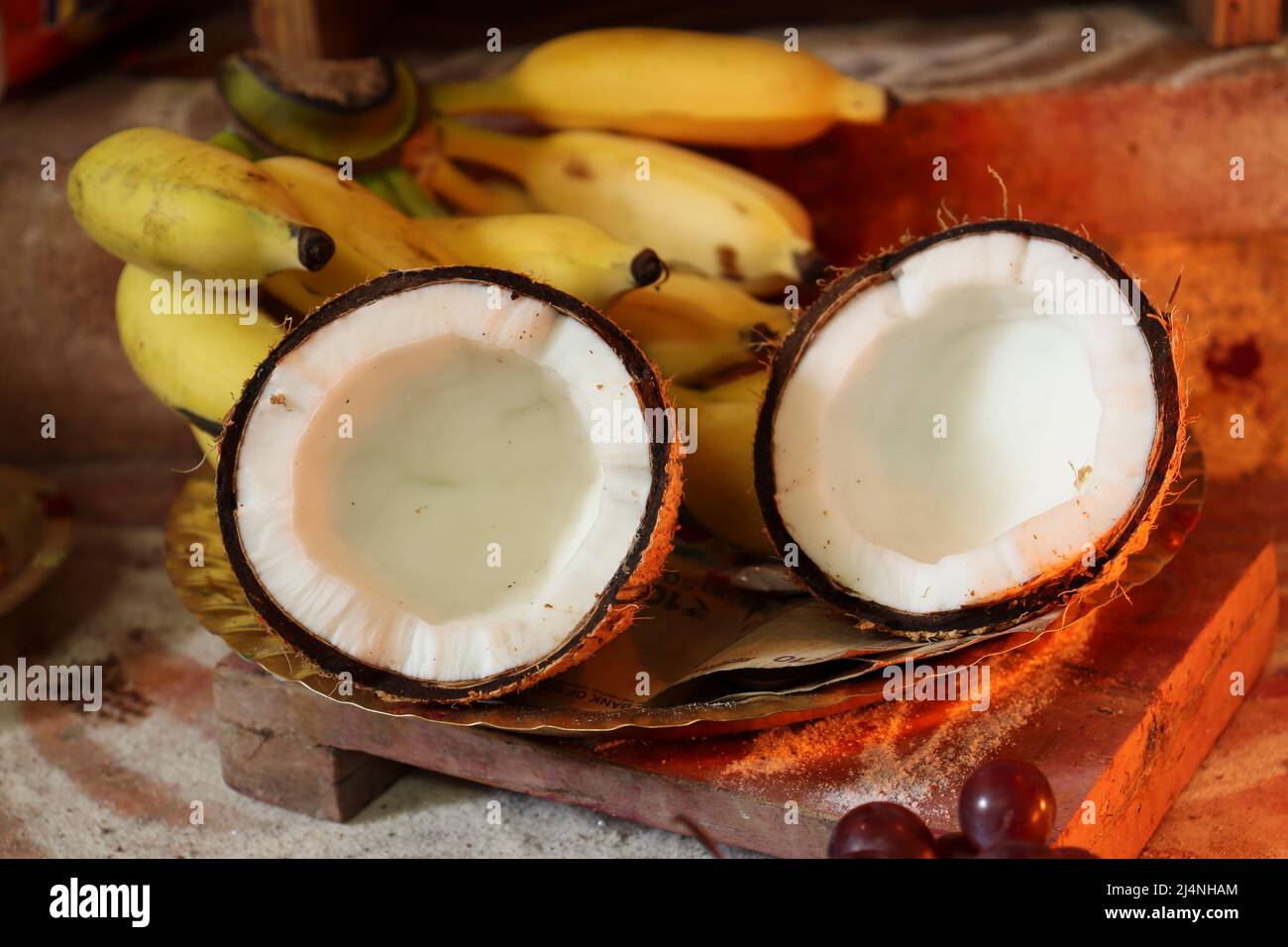 coconut cut into two pieces Stock Photo