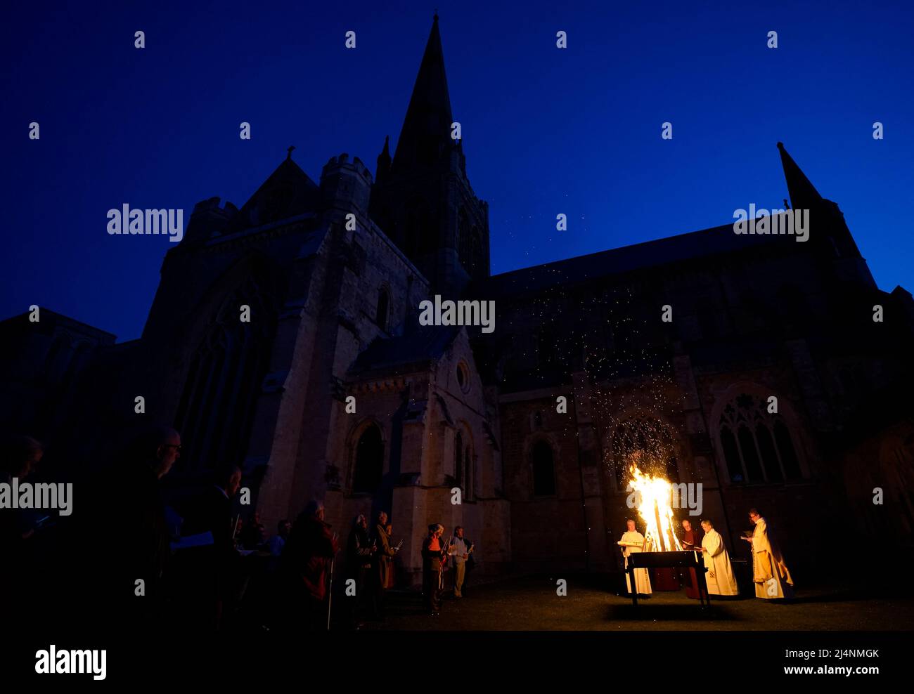 People take part in a Dawn Liturgy of Easter service at Chichester Cathedral prior to the Paschal candle being lit. Picture date: Sunday April 17, 2022. Stock Photo