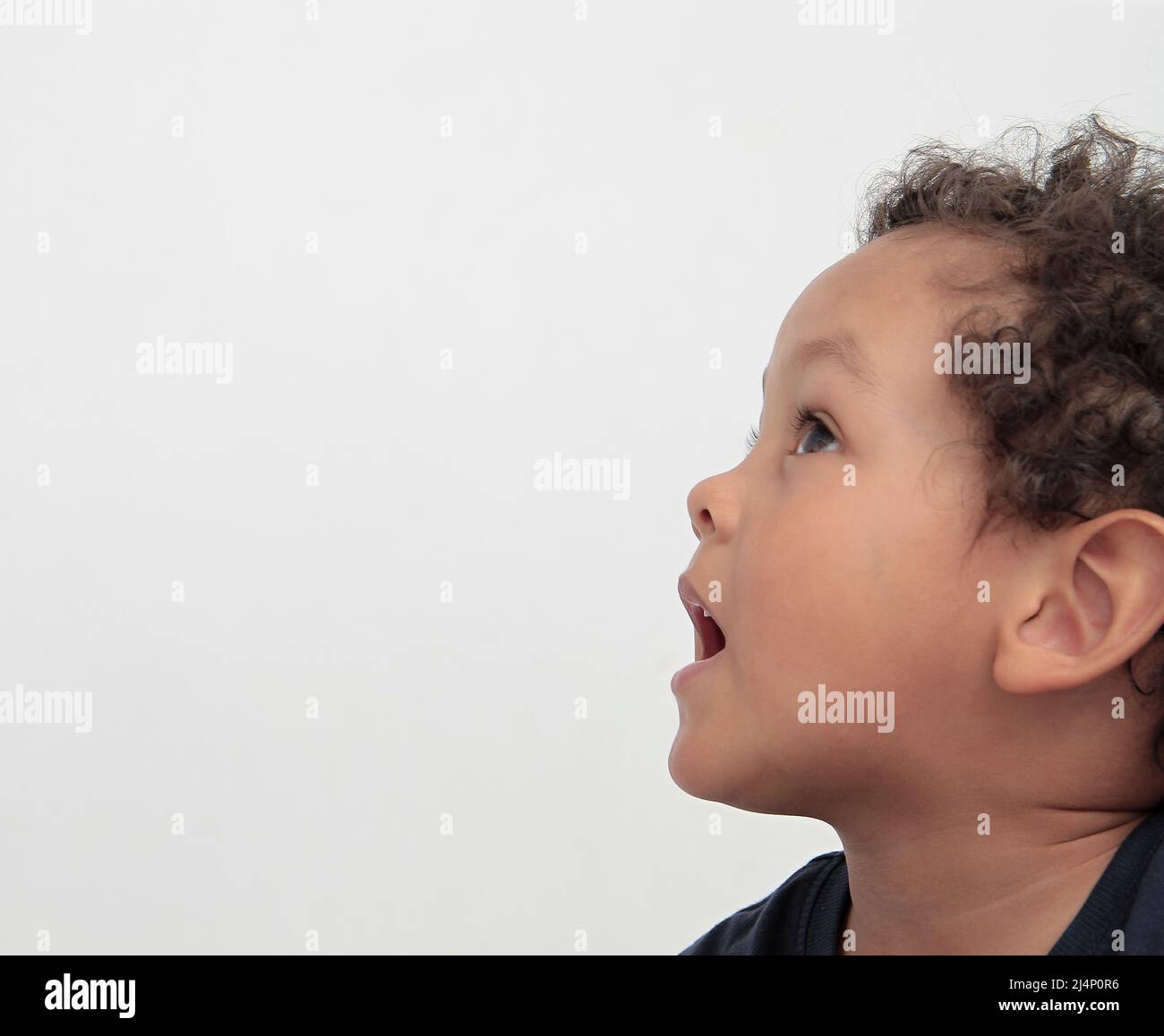 boy shouting with open mouth with people stock image stock photo Stock Photo