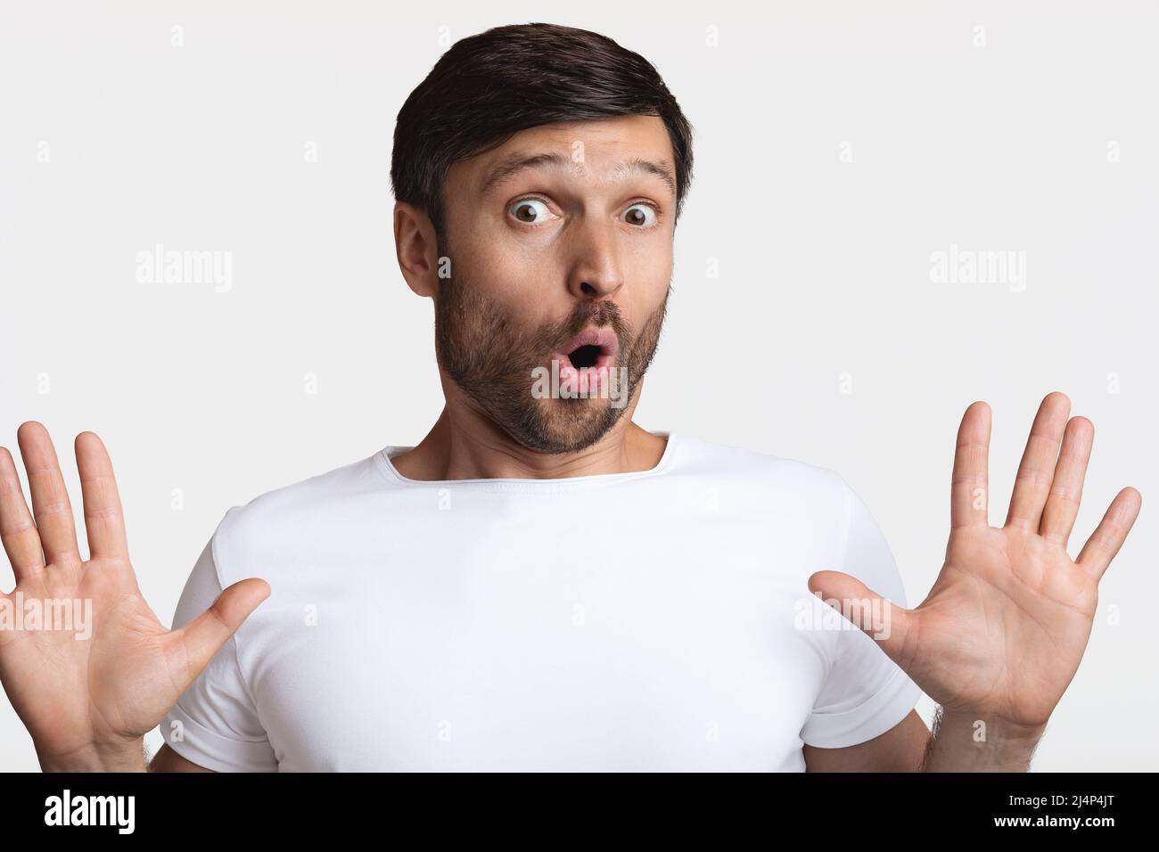 Man scared hands face hi-res stock photography and images - Alamy