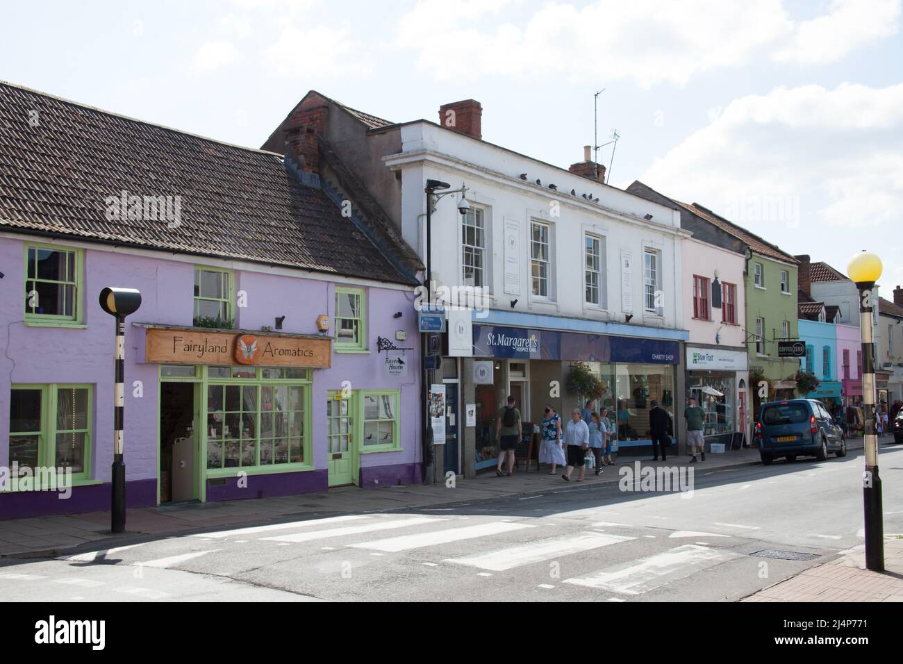 Views of the High Street in Glastonbury, Somerset in the UK Stock Photo