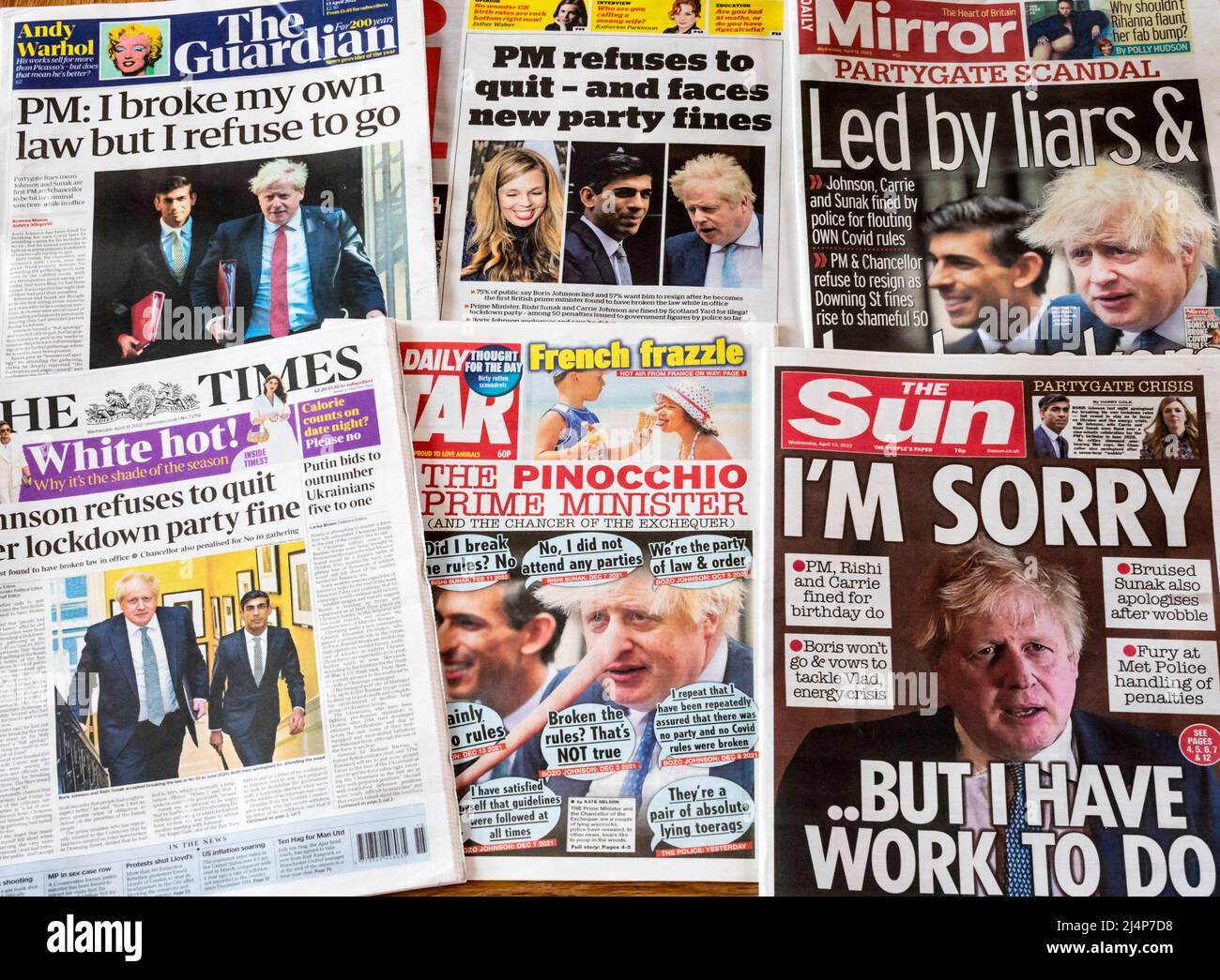 Newspaper front pages following the sending of fixed penalty notices to Carrie & Boris Johnson and Rishi Sunak for breaking COVID restrictions. Stock Photo