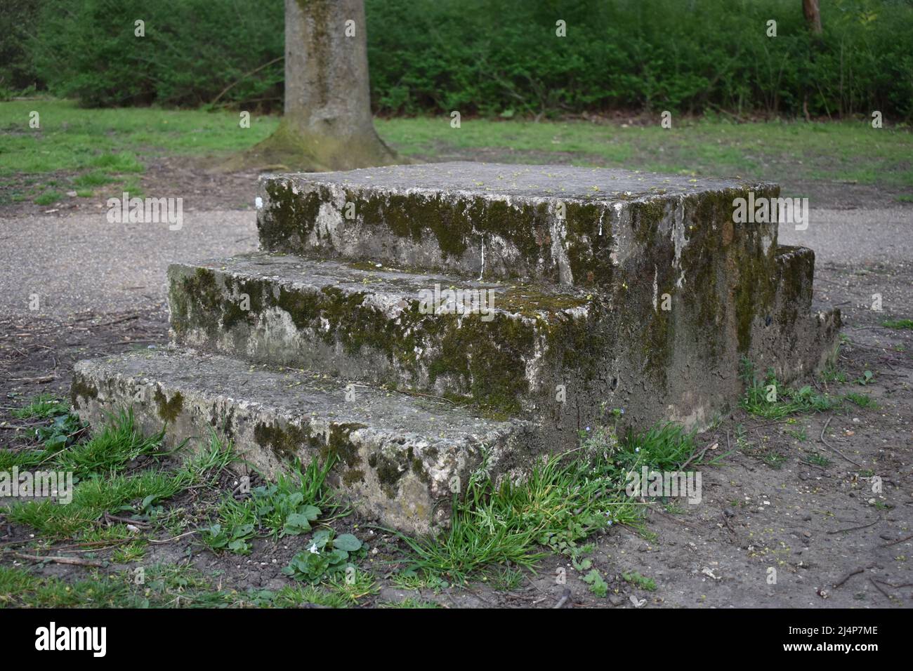 A horse mounting block made of stone in Milton Keynes. Stock Photo