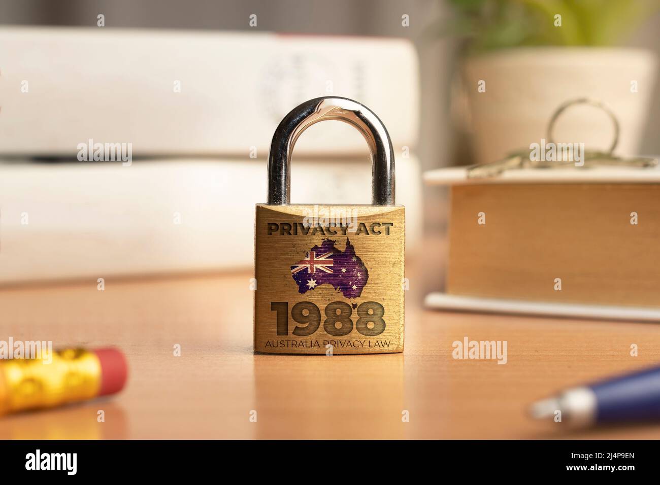 Australia privacy act 1988 concept: a lock with the australian flag on a desk Stock Photo