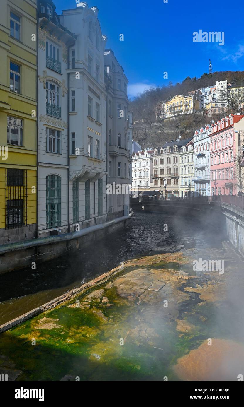 10 April 2022, Czech Republic, Karlovy Vary: Steam from a hot spring rises from the Tepla River in Karlovy Vary (Czech: Karlovy Vary). Karlovy Vary is a spa town in the Bohemia region in the west of the Czech Republic. Thanks to its numerous thermal springs, the town on the edge of the Ore Mountains has been a popular tourist destination since the 19th century. Photo: Patrick Pleul/dpa Stock Photo