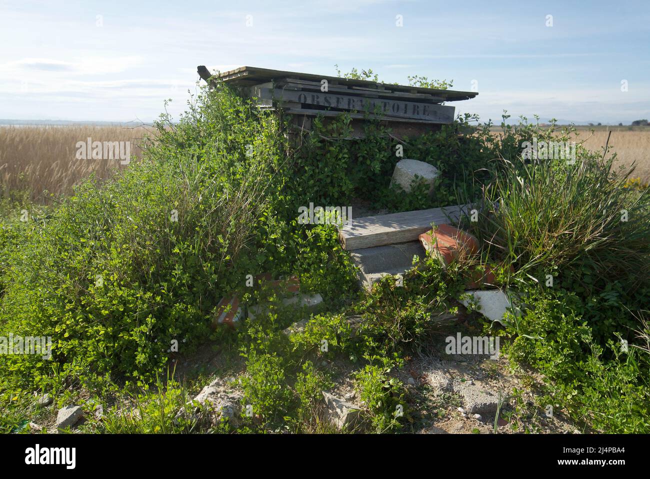 An observatory / observation point on a nature reserve alongside a lagoon by the beach in Southern France, Canet-en-Roussillon. Made of wooden pallets.. Stock Photo