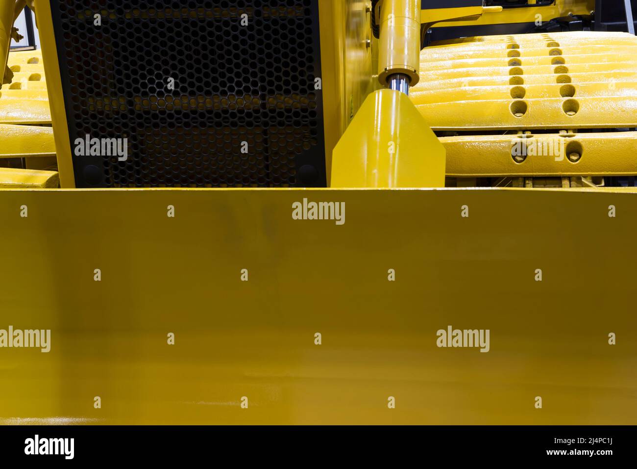 Detail of Loader bucket of excavator for heavy duty job; construction industrial background