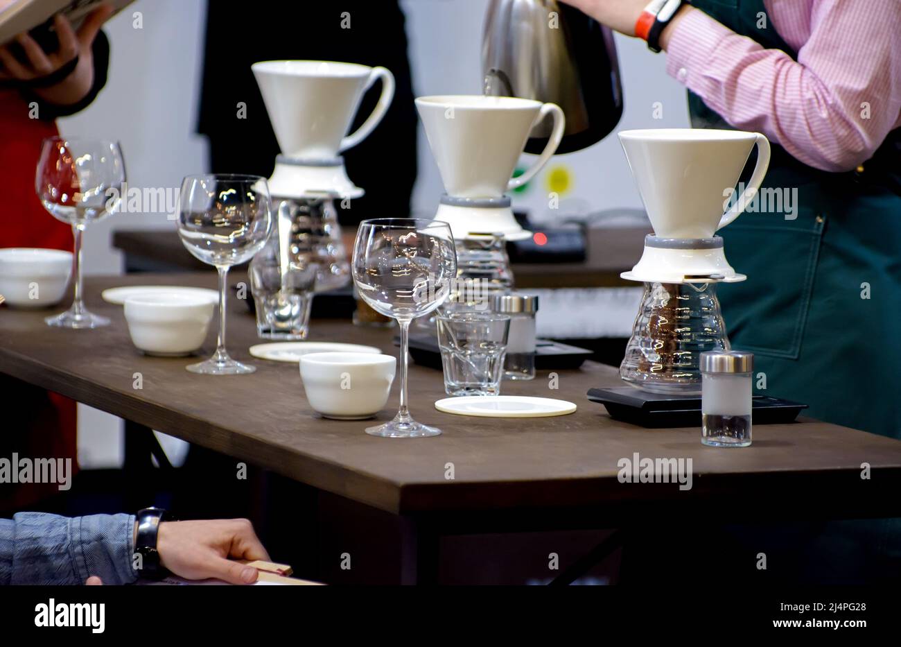 Manual brewing of coffee by professional barista.Shallow DOF Stock