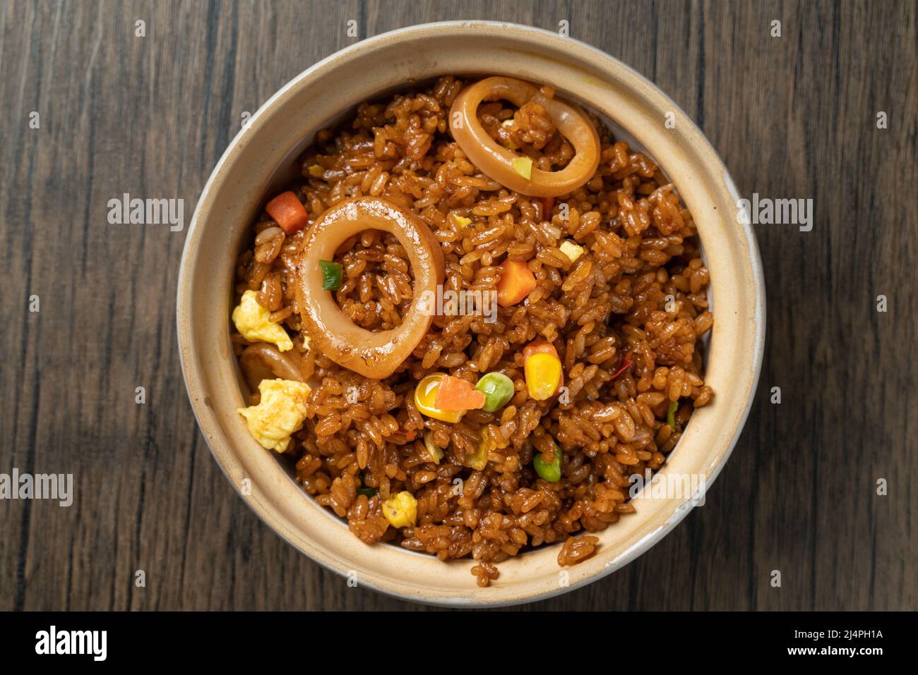 A plate of delicious fried rice with squid Stock Photo