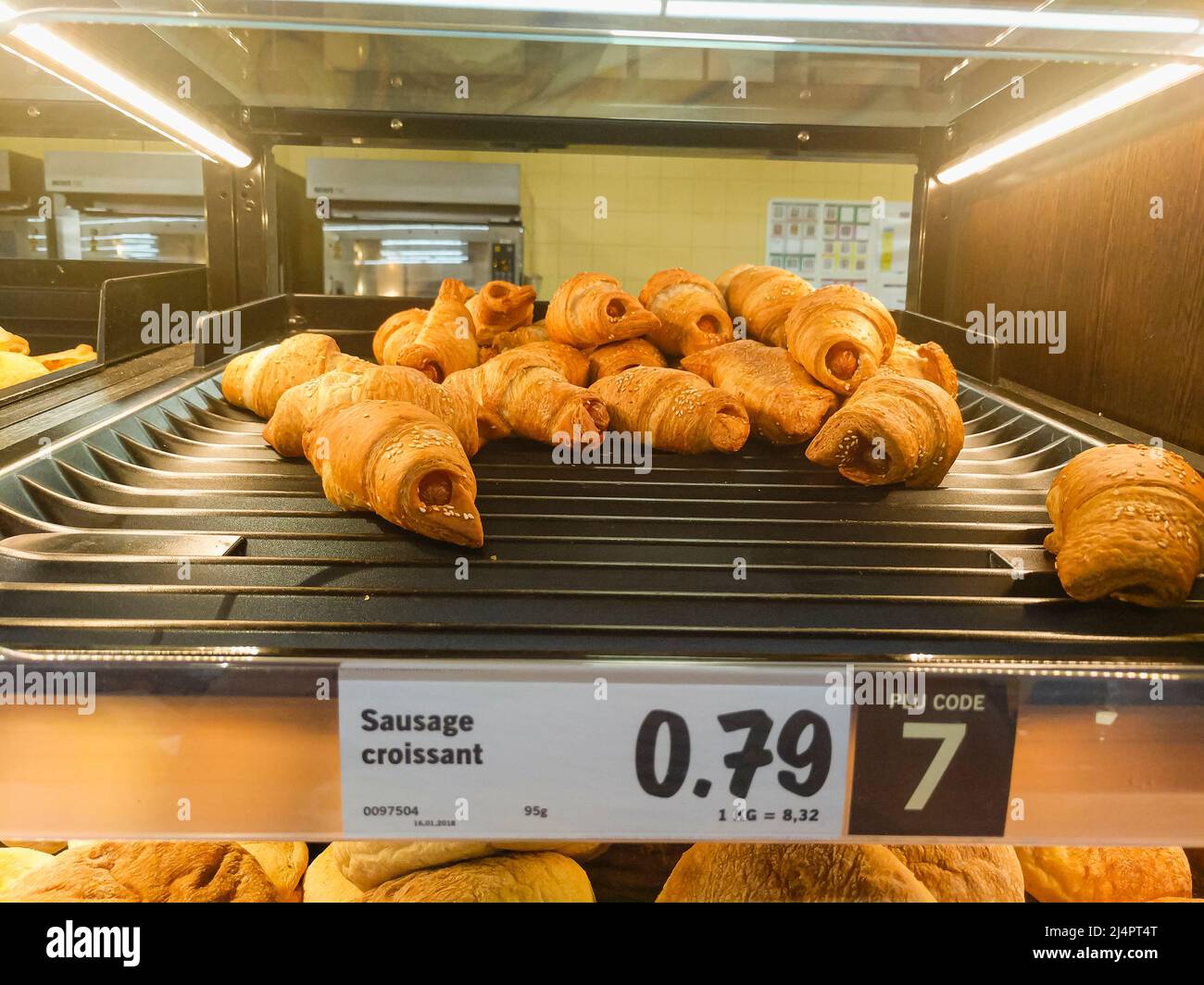 Sausage croissants for sale in a Lidl store. Stock Photo