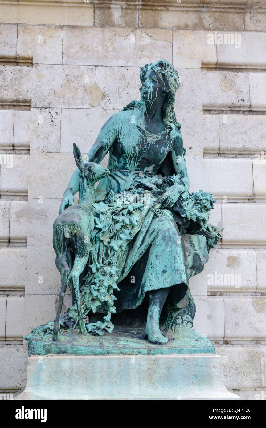 Bronze statue of Ilonka with a deer at the Matthias Fountain, Honvéd Főparancsnokság, Budapest, Hungary. Stock Photo