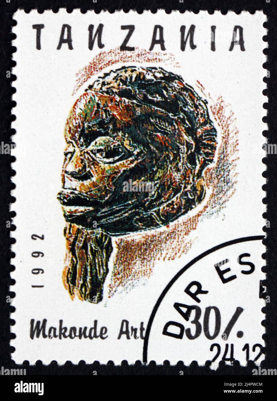 TANZANIA - CIRCA 1992: a stamp printed in Tanzania shows Makonde Art, Carved Face, circa 1992 Stock Photo