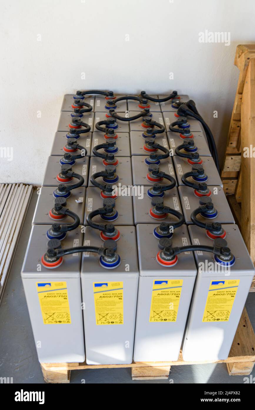 Bank of  batteries storing power from solar panels in a Namibian school. Namibia. Stock Photo