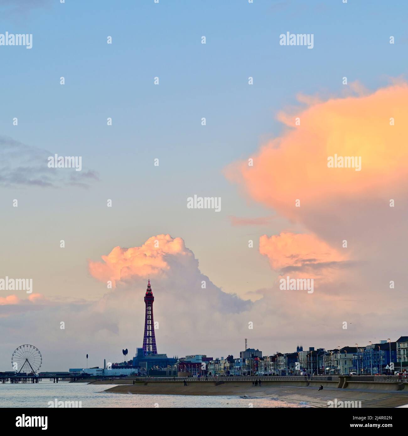 Dramatic cumulus clouds over Blackpool Tower and seafront Stock Photo