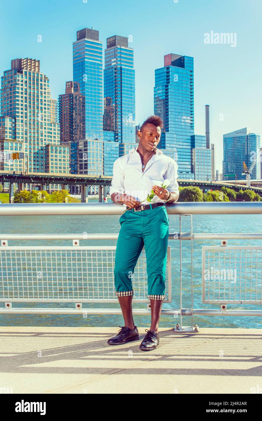 black shirt green pants white shoes