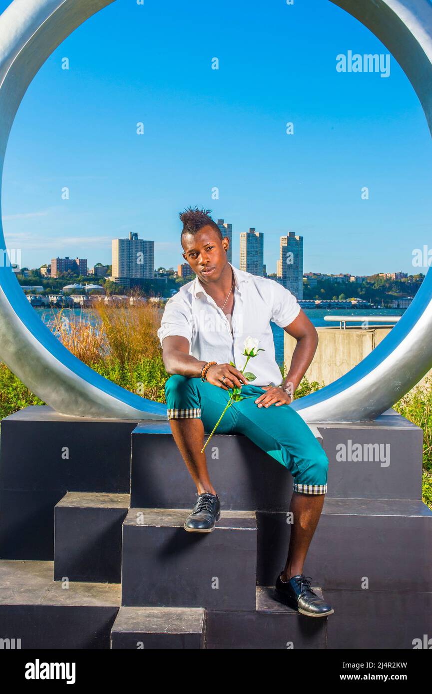 white shirt, green pants, leather shoes 