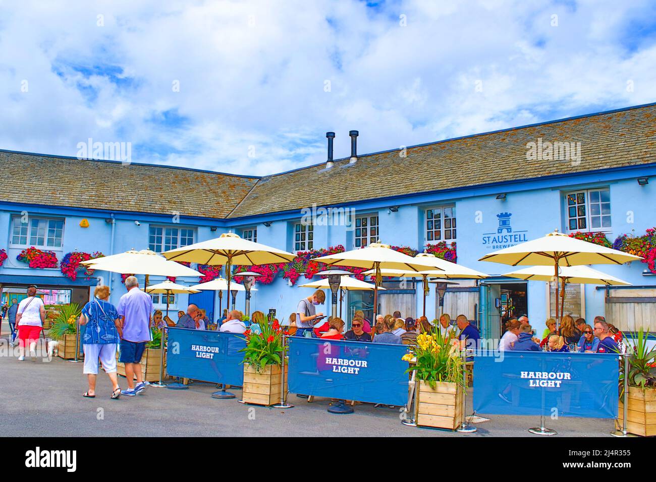 View of Paignton Harbour with boat moorings and restaurants,Devon