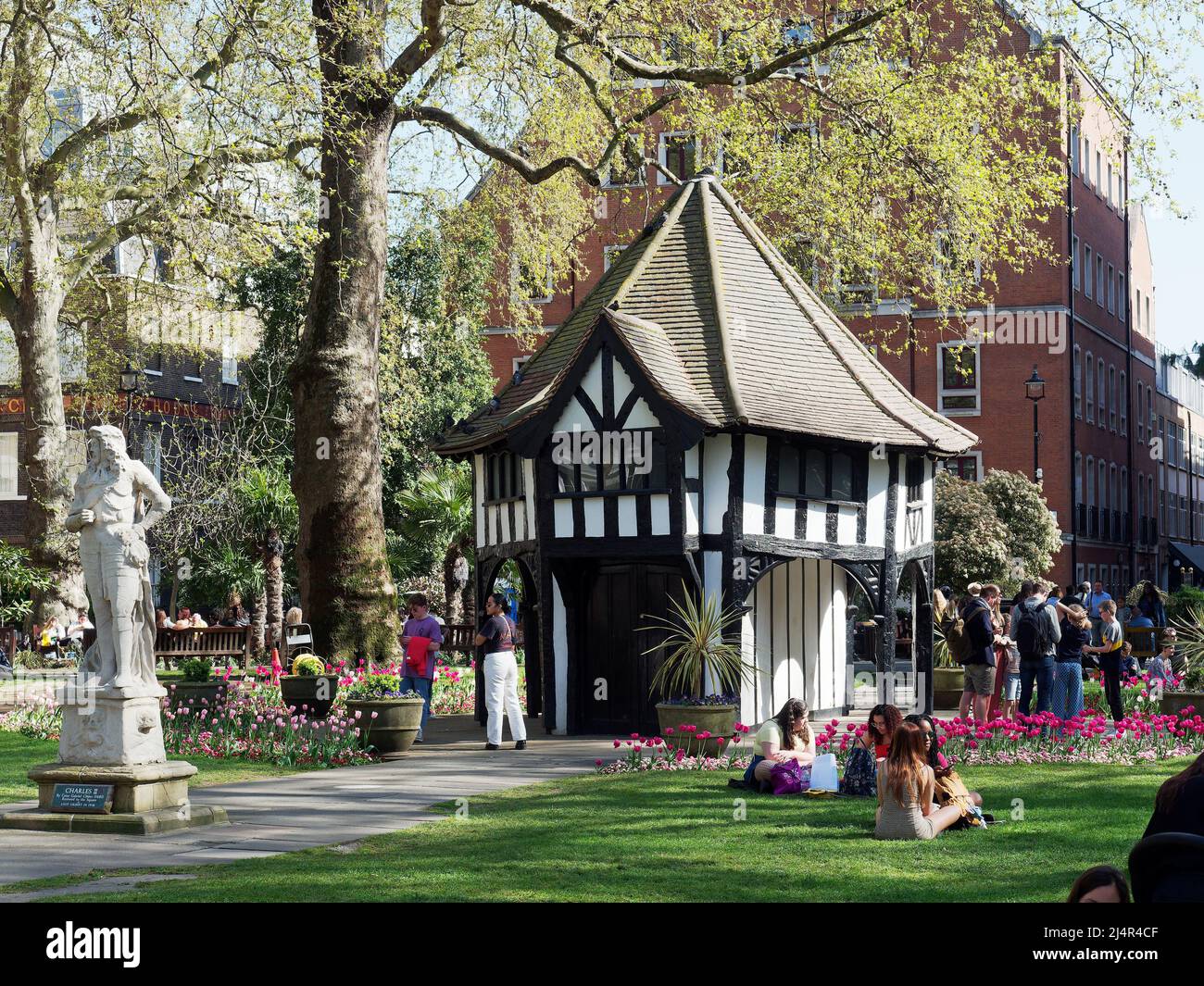 A view of the mock market cross building in the middle of Soho Square Gardens in London UK Stock Photo