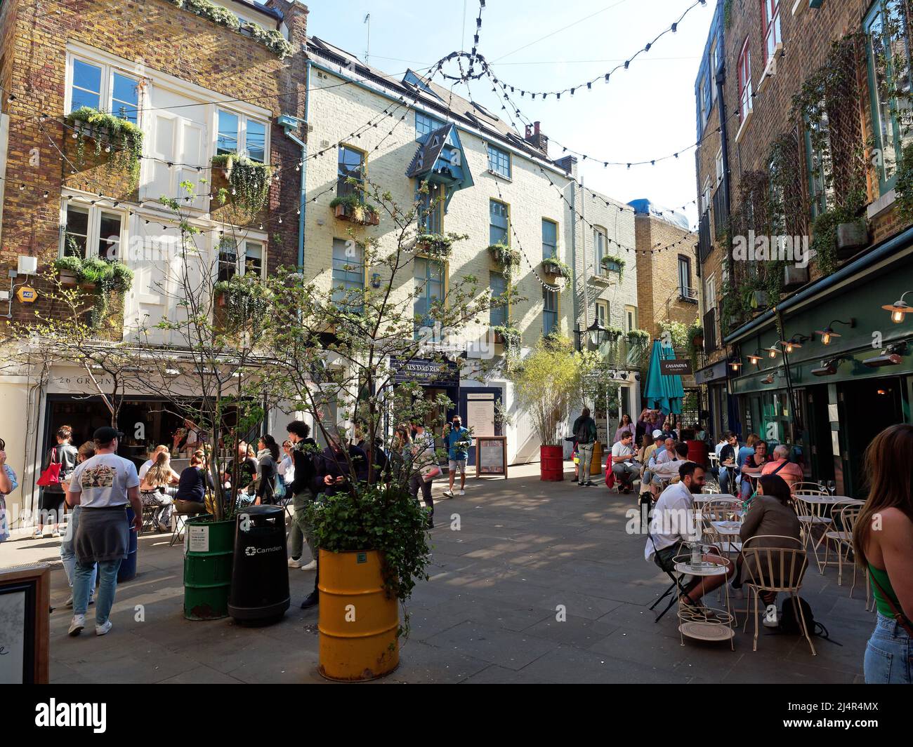 View of Neal's Yard a colourful hidden courtyard of independent restaurants, bars and shops in Covent Garden London Stock Photo