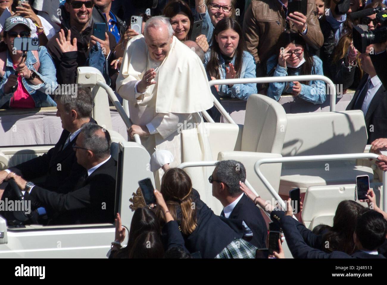 Rome, Italy. 17th Apr, 2022. Pope Francis presided and celebrated the Mass of Easter Day in St. Peter’s Square in front of tens of thousands people. At the end of the Mass, Pope Francis drove through St. Peter’s Square in his Popemobile greeted by the joyful crowd. Credit: LSF Photo/Alamy Live News Stock Photo