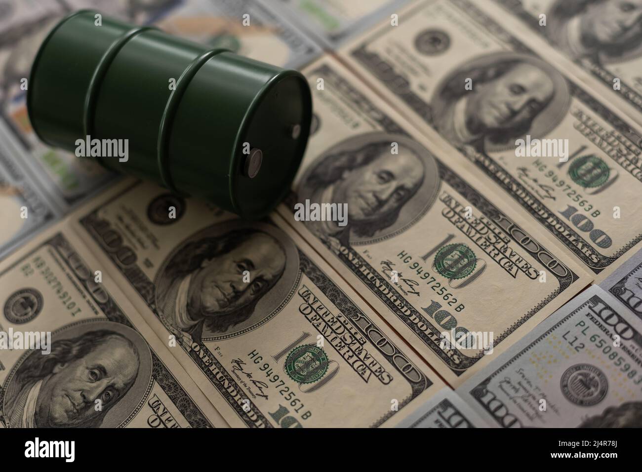 the barrel of oil of one hundred US dollar bills Stock Photo Alamy