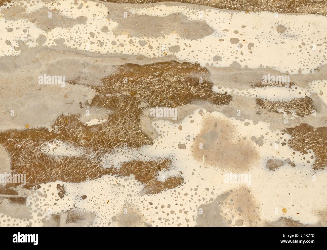 Background with grey, white, and brown flat surfaces - close-up Stock Photo