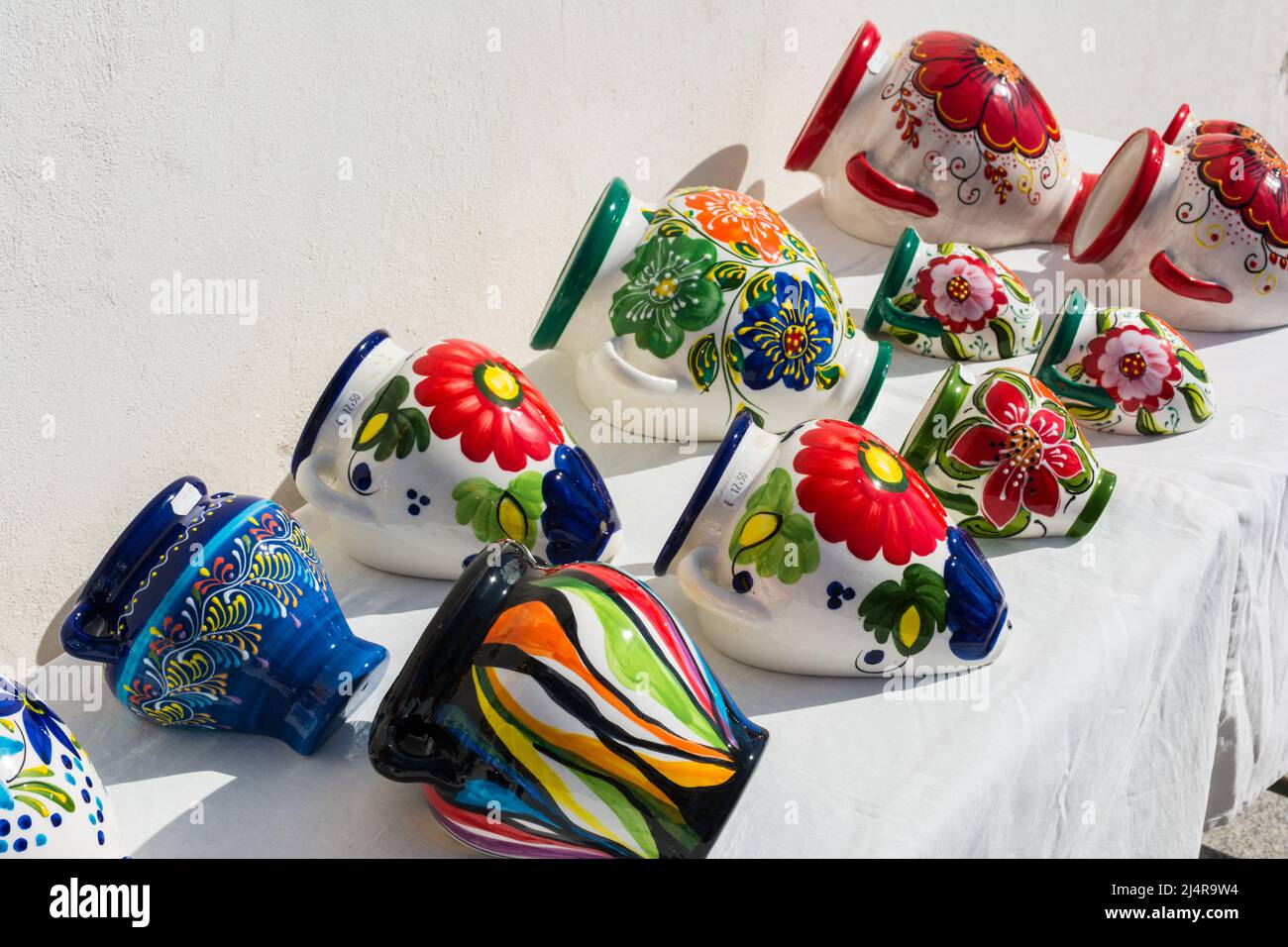 Colorful, ceramic pots exposed for sale in Frigiliana, Spain. Beautiful