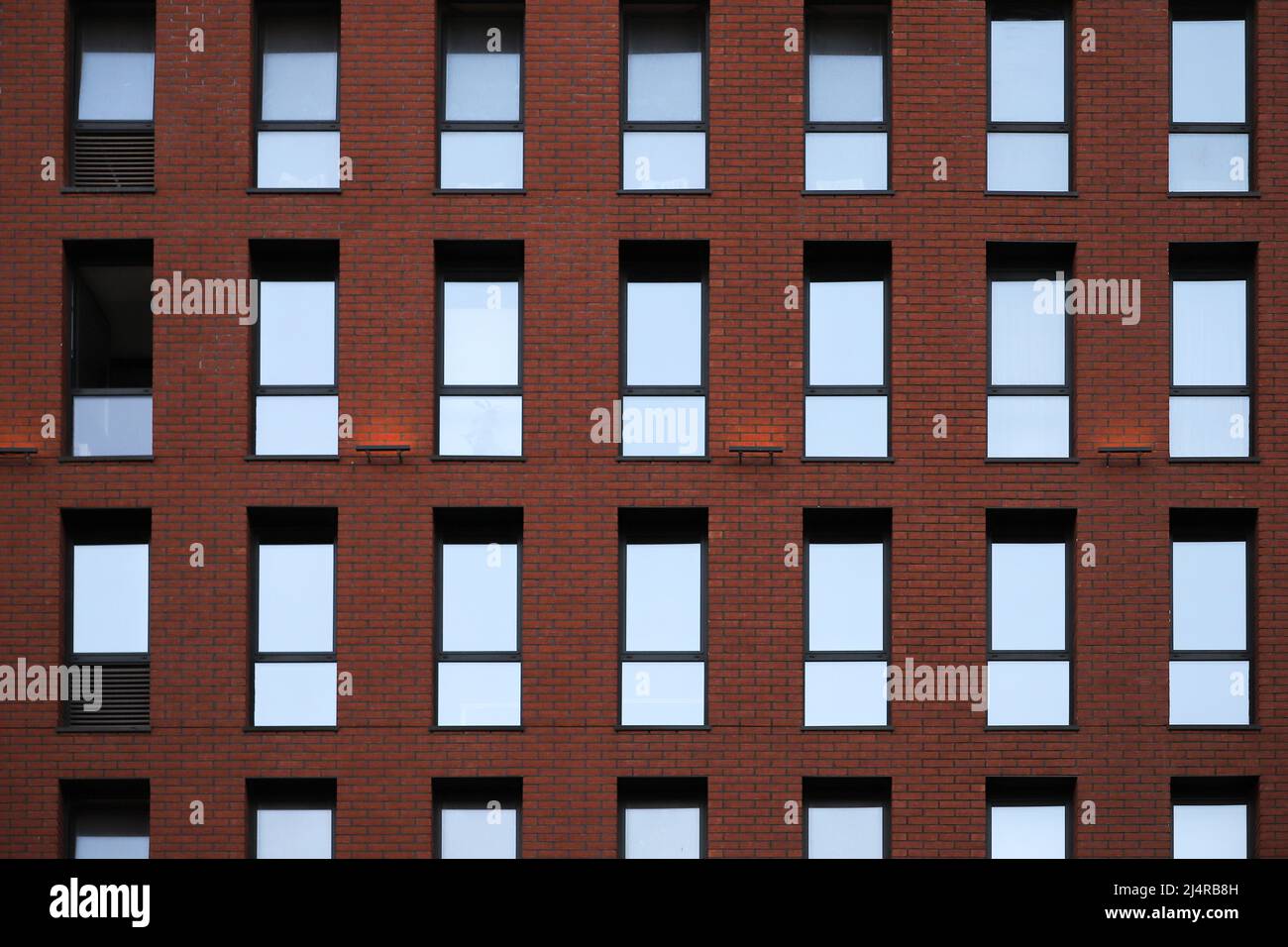 Tall modern apartment building Stock Photo - Alamy