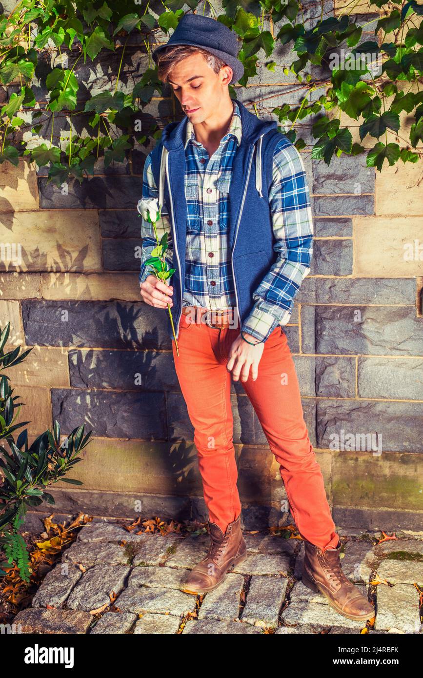 Wearing jeans and vest hi-res stock 
